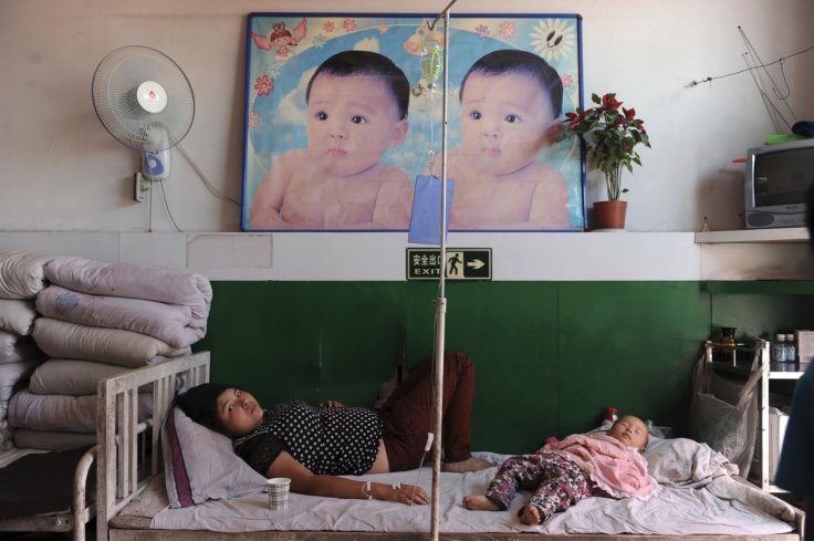 File photo of an ethnic Uighur woman on a drip at a hospital in Shaya county of Aksu