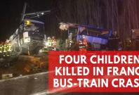 4 children killed in France as school bus cut in two after collision with train 4 children killed in France as school bus cut in two after collision with train