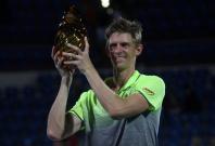 Kevin Anderson of South Africa holds the trophy after wining his match against Roberto Bautista Agut of Spain. 