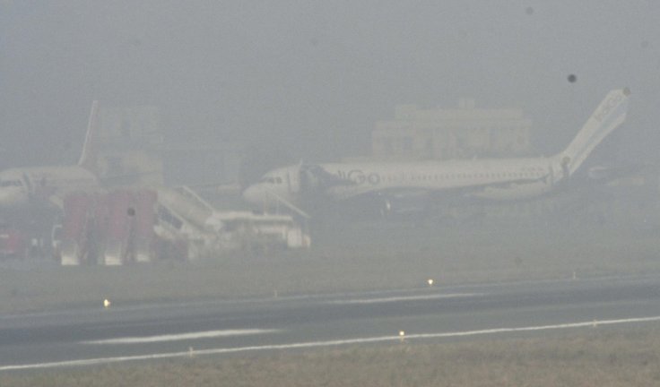 Delhi fogged up on New Year Day, flights, trains disrupted Delhi fogged up on New Year Day, flights, trains disrupted