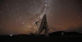 Night falls over radio telescope dishes of the KAT-7 Array at the proposed South African site for the Square Kilometre Array (SKA) telescope near Carnavon in the country's remote Northern Cape province