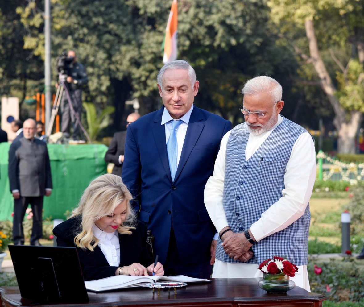 Sara Netanyahu, wife of the Prime Minister of Israel, Mr. Benjamin Netanyahu signing the visitors’ book, at Teen Murti Chowk