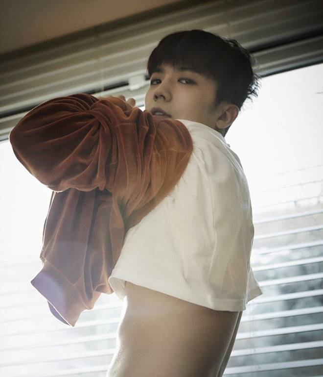 Wooyoung in an album concept photo released by JYP Entertainment