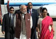 Prime Minister Narendra Modi being welcomed by the Chief Minister of Rajasthan, Smt. Vasundhara Raje