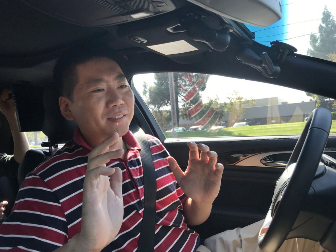 Nullmax CEO Lei Xu drives a Lincoln MKZ sedan equipped with his company's prototype self-driving hardware and software in Fremont, California