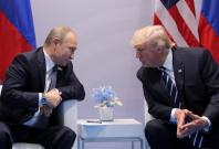GermanyRussia's President Vladimir Putin talks to President Donald Trump during their bilateral meeting at the G20 summit in Hamburg