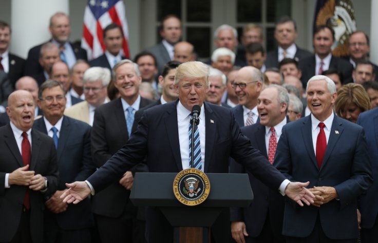 President Donald Trump gathers with Vice President Mike Pence 