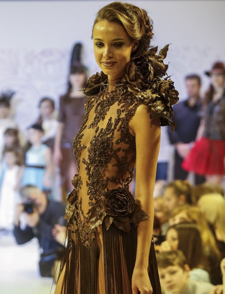 A model displays a chocolate embroidered dress at the Salon du Chocolat in Moscow, Russia, March 6, 2016. 