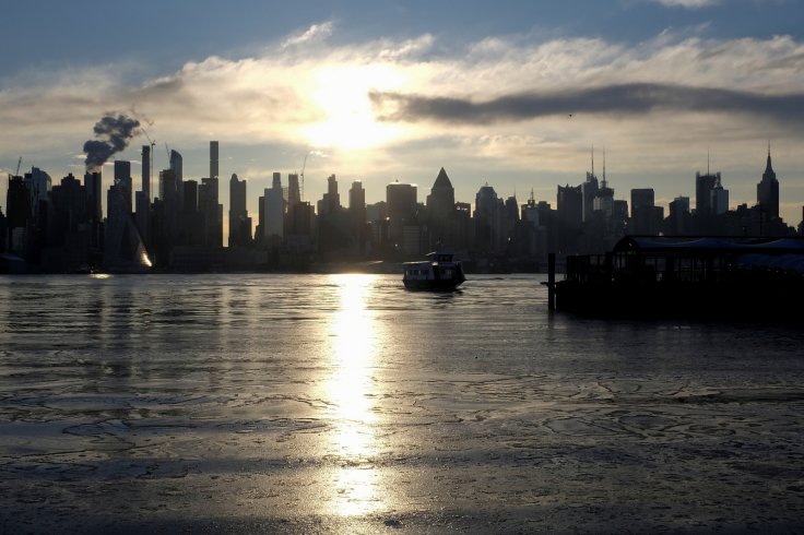 Ice coats the Hudson River as a river ferry departs for New York City from Weehawken, New Jersey, U.S.