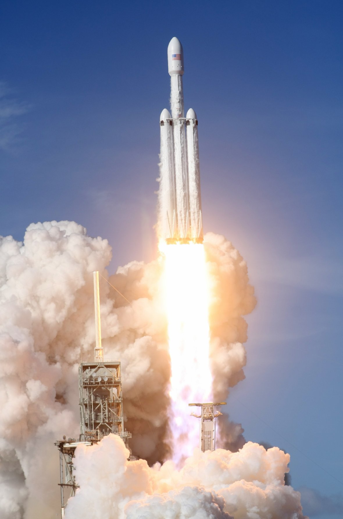 A SpaceX Falcon Heavy rocket lifts off from the Kennedy Space Center in Cape Canaveral