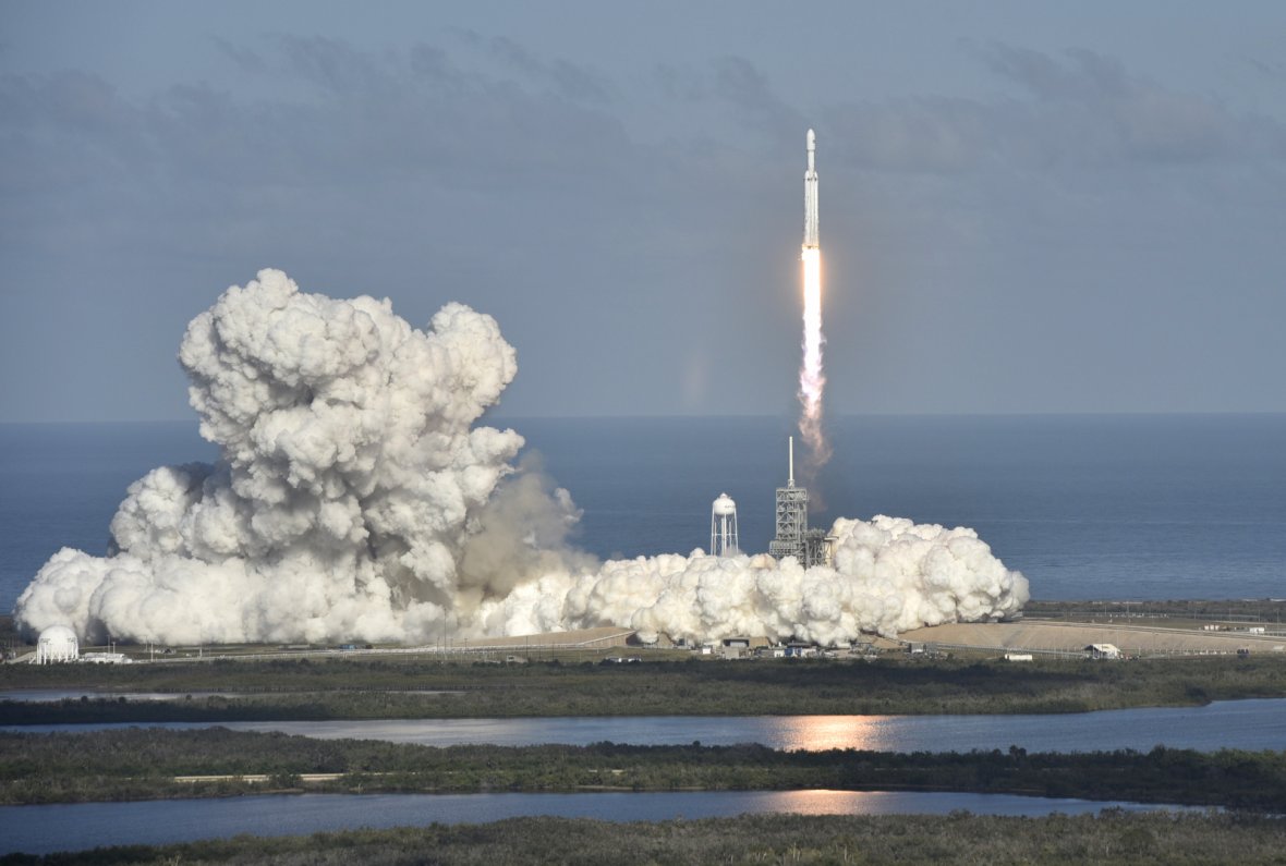 A SpaceX Falcon Heavy rocket lifts off from the Kennedy Space Center in Cape Canaveral