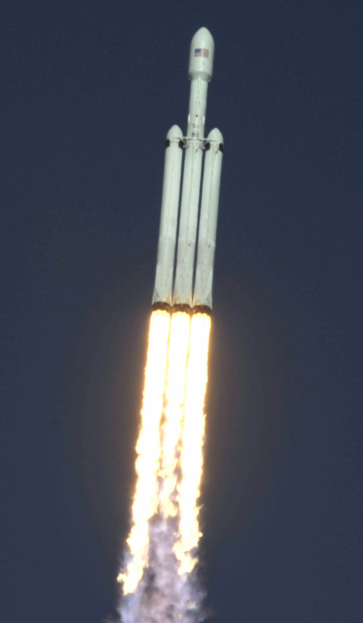 A SpaceX Falcon Heavy rocket lifts off from the Kennedy Space Center in Cape Canaveral