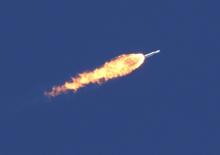 A SpaceX Falcon Heavy rocket lifts off from the Kennedy Space Center in Cape Canaveral