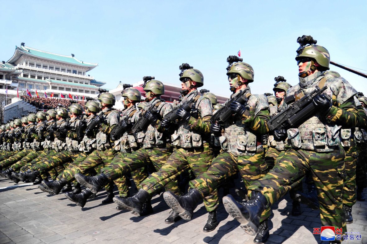 Soldiers march during a grand military parade celebrating the 70th founding anniversary of the Korean