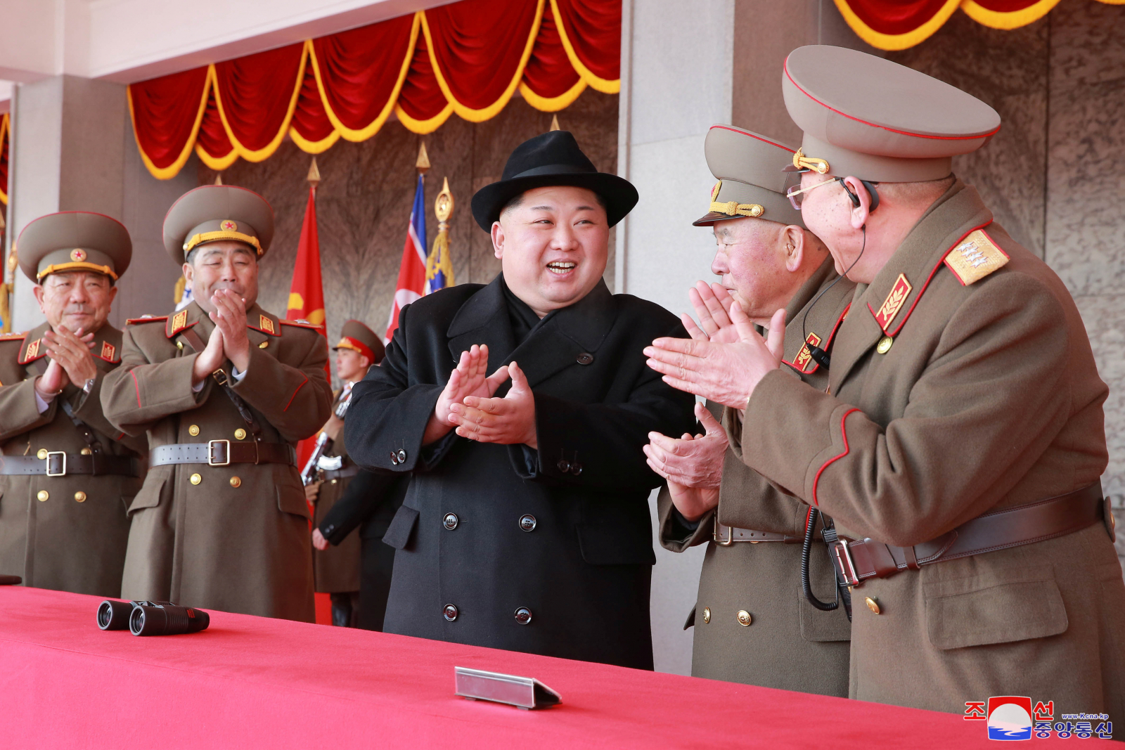 North Korean leader Kim Jong Un attends a grand military parade celebrating the 70th founding anniversary