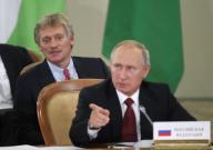 Russia's President Putin and Kremlin spokesman Dmitry Peskov