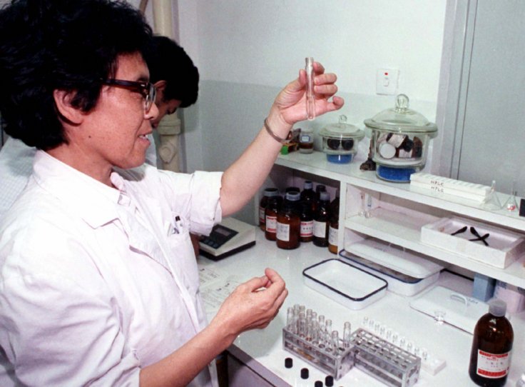  Lab technician checking sample in Beijing.