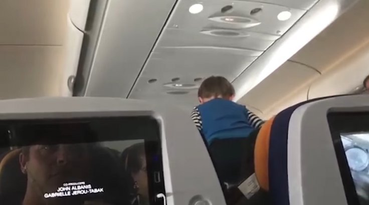Demonic child inside plane 