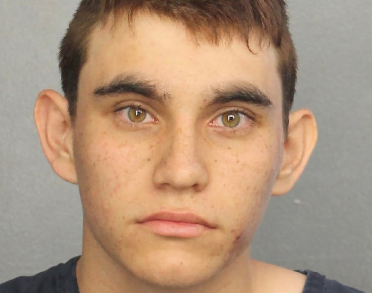 Nikolas Cruz appears in a police booking photo after being charged with 17 counts