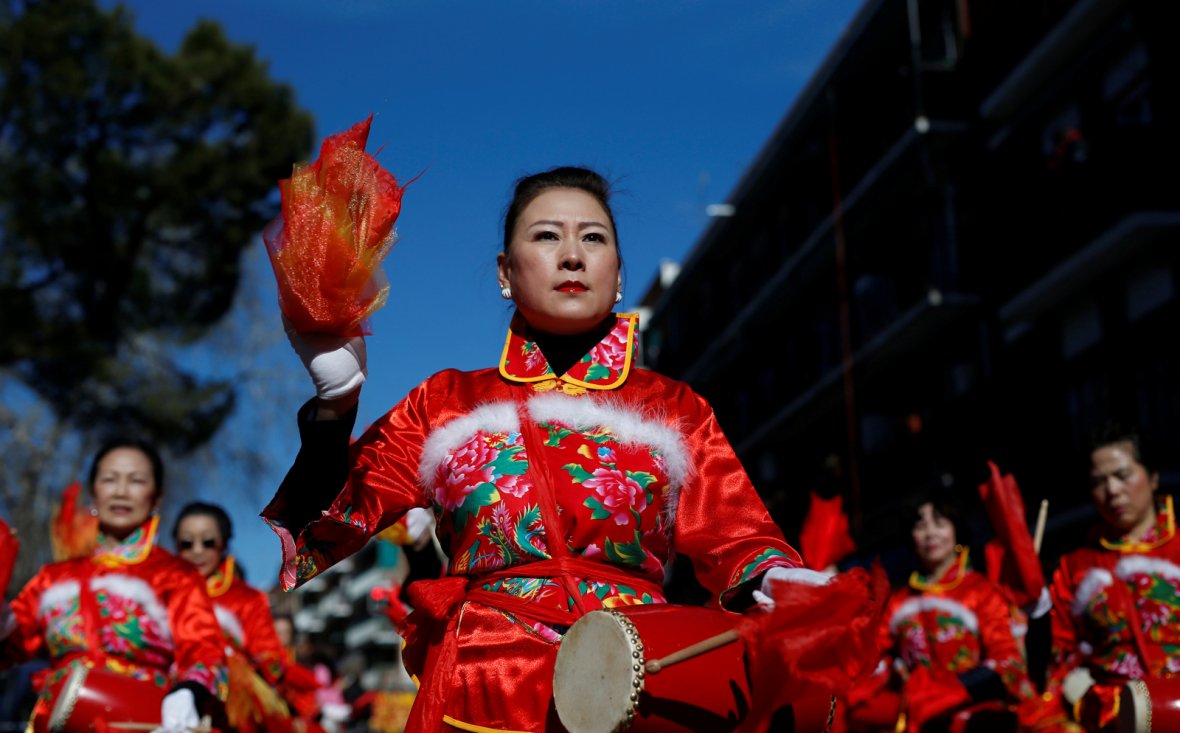Members of the Chinese community celebrate the Lunar New Year of the Dog with a colourful parade