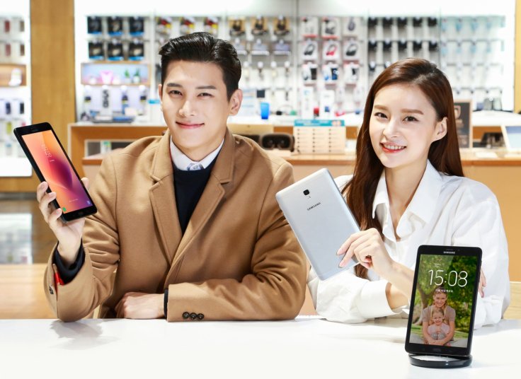 Seoul: Models pose with Galaxy Tab A tablet PCs in this photo released by Samsung Electronic