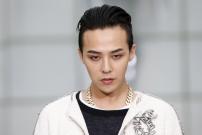 South Korean singer Kwon Ji Yong, known as G-Dragon, poses during a photocall before German designer Karl Lagerfeld Haute Couture Spring Summer 2015 fashion show 