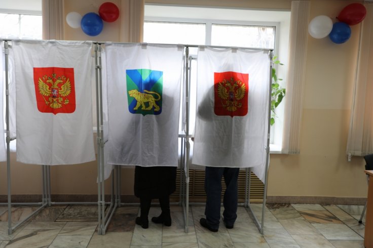 VLADIVOSTOK, March 18, 2018 (Xinhua) -- Voters write ballots at a polling station in Vladivostok, east Russia, March 18, 2018. Russia held presidential election on Sunday. (Xinhua/Denis/IANS)