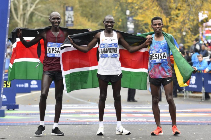 (From left to right) Wilson Kipsang and Geoffrey Kamworor and Lelisa Desisa poses for a photo following the Professional Men's division race at the 2017 TCS New York City Marathon.