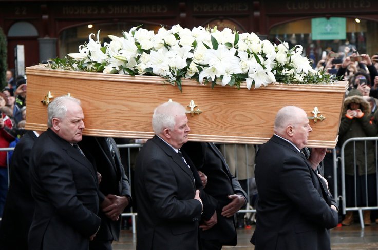 Pallbearers carry the coffin out of Great St Marys Church at the end of the funeral of theoretical physicist Prof Stephen Hawking, in Cambridge, Britain, March 31, 2018. 