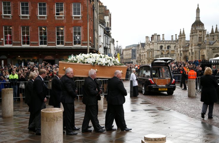 Pallbearers carry the coffin out of Great St Marys Church at the end of the funeral of theoretical physicist Prof Stephen Hawking, in Cambridge, Britain, March 31, 2018. 