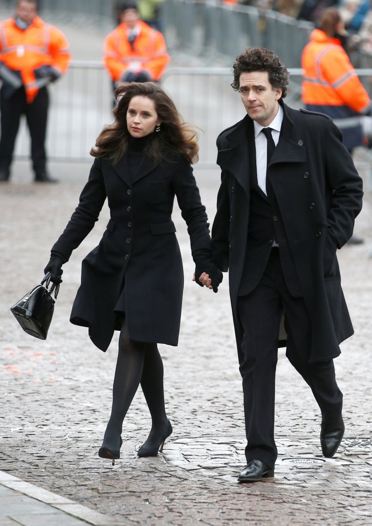 British actor Felicity Jones and film director Charlie Guard arrive at Great St Marys Church, where the funeral of theoretical physicist Prof Stephen Hawking is being held, in Cambridge, Britain, March 31, 2018.