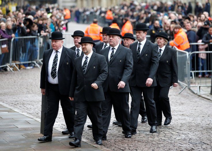 University of Cambridge college porters arrive at Great St Marys Church, where the funeral of theoretical physicist Prof Stephen Hawking is being held, in Cambridge, Britain, March 31, 2018