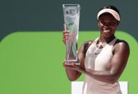 Sloane Stephens of the United States poses with the Butch Buchholz championship trophy after her match against Jelena Ostapenko of Latvia (not pictured) during the women's singles final of the Miami Open at Tennis Center at Crandon Park. Stephens won 7-6(