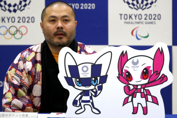 The designer of winning mascots Ryo Taniguchi attends a news conference after Tokyo Olympics organizers unveiled the mascots for the Tokyo 2020 Olympics and Paralympics selected by popular vote by elementary students across Japan at the Hoyonomori Gakuen 