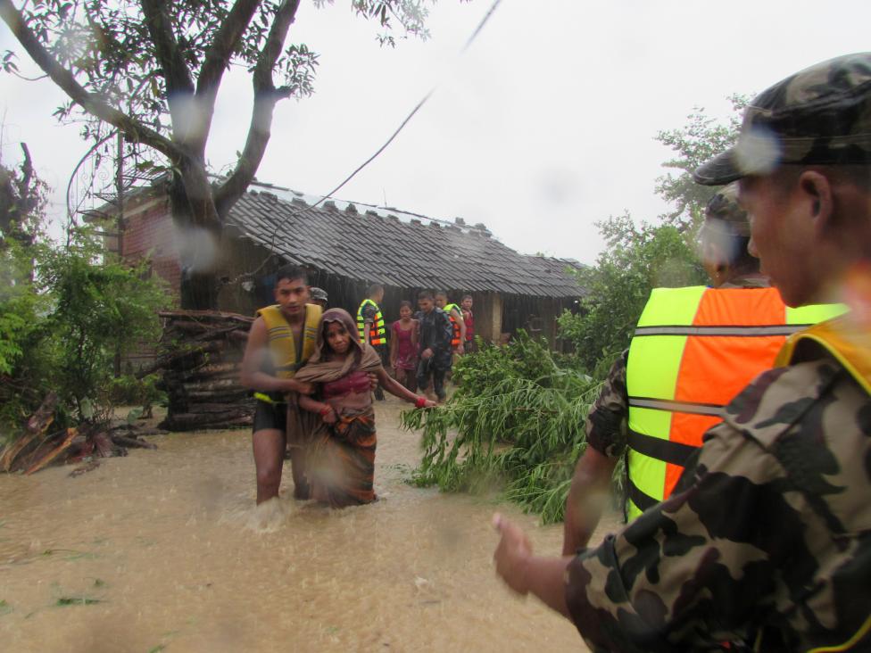 Flash floods kill scores in Nepal, India