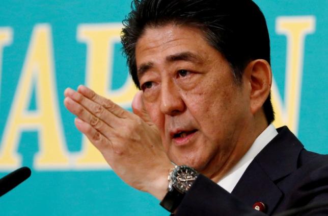 Japan PM Abe to reshuffle cabinet on August 3, says Suga