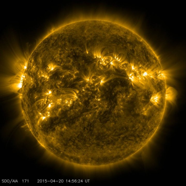 Bright spots and illuminated arcs of solar material hovering in the sun's atmosphere highlight what's known as active regions on the sun, in this image from NASA's Solar Dynamics Observatory, captured on April 20, 2015. These are areas of intense and comp