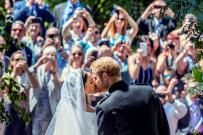 Meghan Markle and Prince Harry kiss on the steps of St George's Chapel at Windsor Castle following their wedding