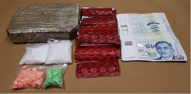 Cannabis, ‘Ice’, ‘Ecstasy’ tablets, Erimin-5 tablets and cash seized in CNB operation on 23 May 2018.