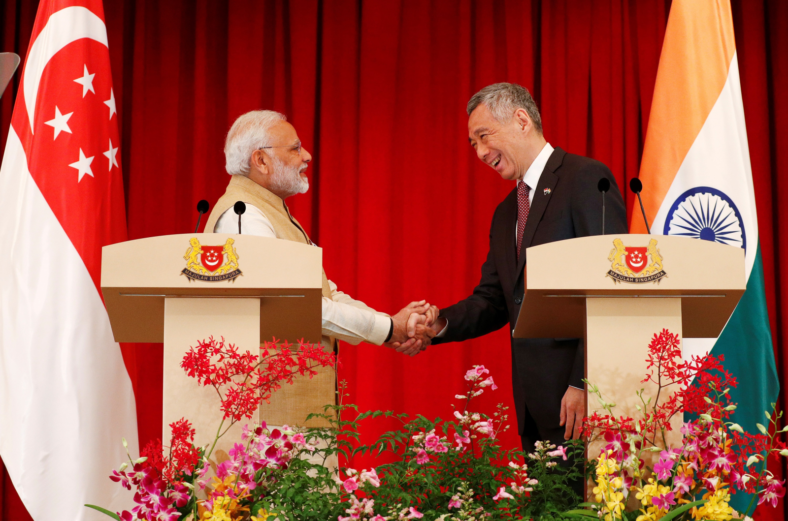 Indian PM Narendra Modi pays tribute to Mahatma Gandhi in Singapore ...