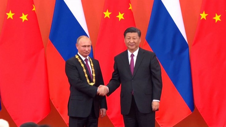 russian-president-vladimir-putin-receives-friendship-medal-from-chinese-president-xi-jinping