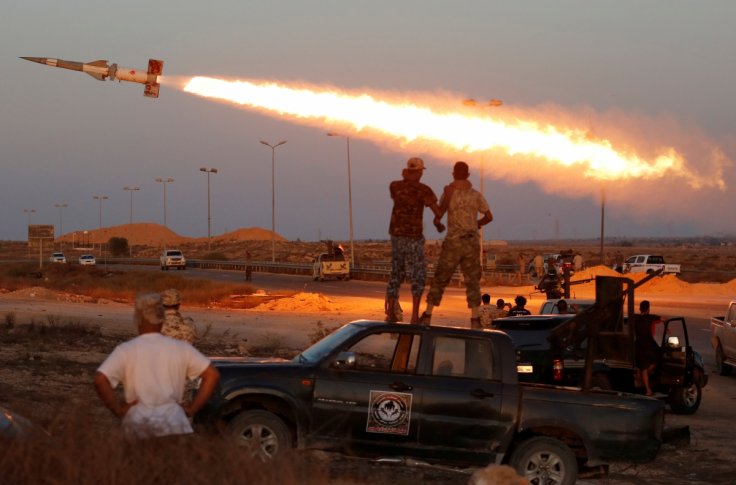 Fighters of Libyan forces allied with the UN backed government fire a rocket at Islamic State fighters in Sirte, Libya Fighters of Libyan forces allied with the UN backed government fire a rocket at Islamic State fighters in Sirte, Libya