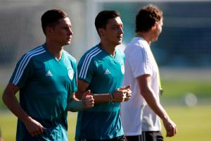 Soccer Football - World Cup - Germany Training - Germany Training Camp, Moscow, Russia - June 16, 2018 Germany's Julian Draxler and Mesut Ozil during training Soccer Football - World Cup - Germany Training - Germany Training Camp, Moscow, Russia - June 16, 2018 Germany's Julian Draxler and Mesut Ozil during training