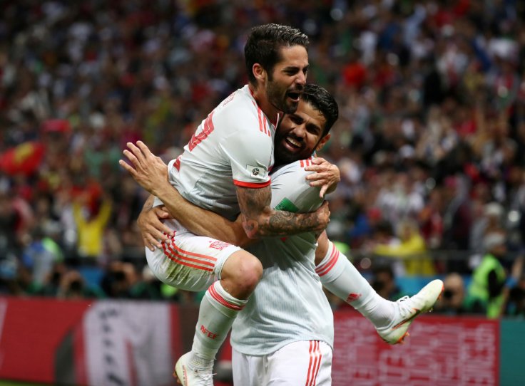 Spain's Diego Costa celebrates scoring their first goal with Isco 
