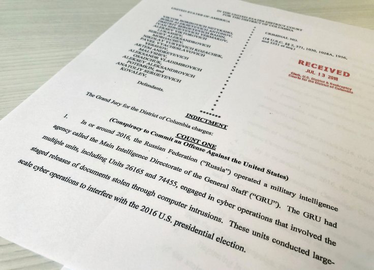 A copy of the grand jury indictment against 12 Russian intelligence officers is seen after the indictments were filed in U.S. District Court by prosecutors working as part of special counsel Robert Mueller's Russia investigationÊin Washington, U.S.