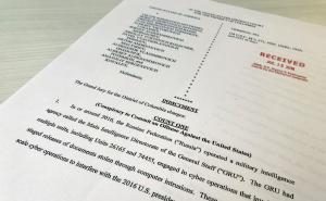 A copy of the grand jury indictment against 12 Russian intelligence officers is seen after the indictments were filed in U.S. District Court by prosecutors working as part of special counsel Robert Mueller's Russia investigationÊin Washington, U.S. A copy of the grand jury indictment against 12 Russian intelligence officers is seen after the indictments were filed in U.S. District Court by prosecutors working as part of special counsel Robert Mueller's Russia investigationÊin Washington, U.S.