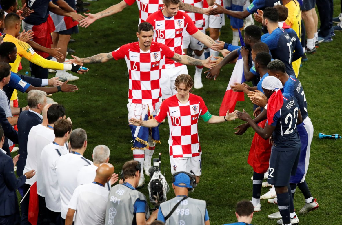 Croatia players shake hands with France players 