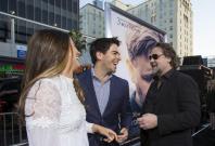 Director of the movie and cast member Russell Crowe (R) greets actor Eli Roth and his wife Lorenza Izzo at the premiere of "The Water Diviner" at the TCL Chinese theatre in Hollywood, California April 16, 2015. The movie opens limitedly in the U.S. on Apr Director of the movie and cast member Russell Crowe (R) greets actor Eli Roth and his wife Lorenza Izzo at the premiere of "The Water Diviner" at the TCL Chinese theatre in Hollywood, California April 16, 2015. The movie opens limitedly in the U.S. on Apr