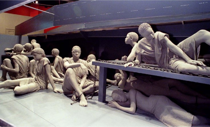 Life-size sculptures of enslaved Africans are part of a 70-foot replica of a slave ship featured in the core exhibit at Detroit's new Museum of African American History. The slave ship with 50 figures is a silent commemoration of Africans who lost their l