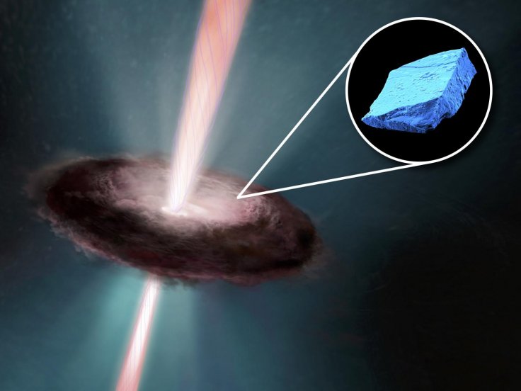 Illustration of the early solar disk, with an inset image of a blue hibonite crystal, one of the first minerals to form in the Solar System.